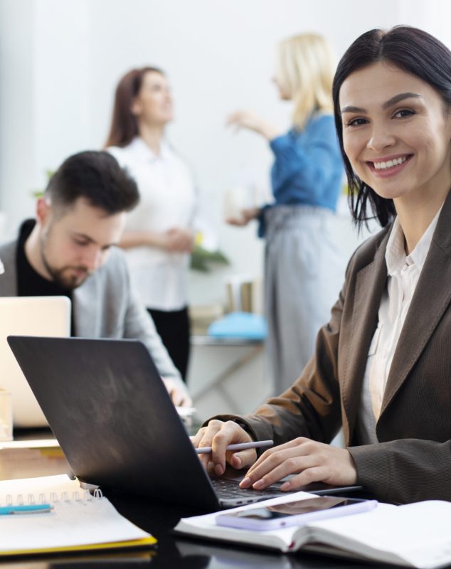 medium-shot-woman-working-laptop aboutus3